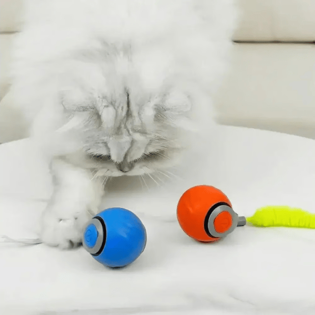 Pelota rodante eléctrica interactiva con cola burlona